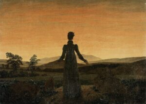 Woman before the rising or setting sun